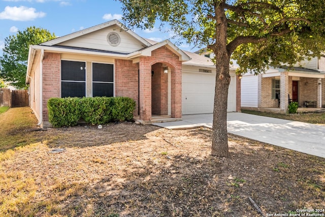 view of front of property with a garage