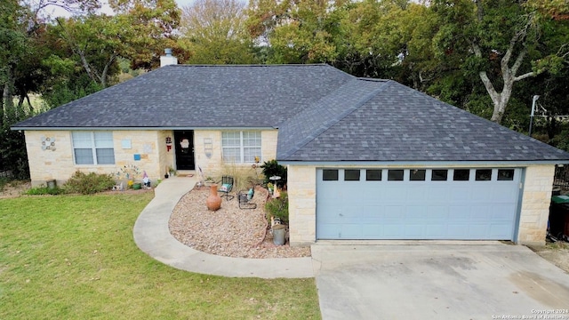 ranch-style home featuring a garage and a front lawn