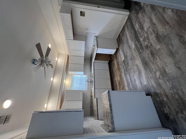 kitchen with a high ceiling and ceiling fan