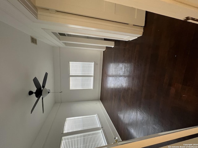 empty room featuring wooden walls