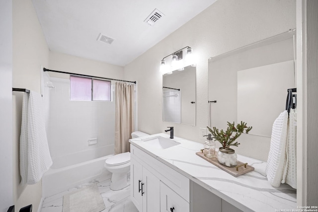 full bathroom featuring shower / tub combo, vanity, and toilet