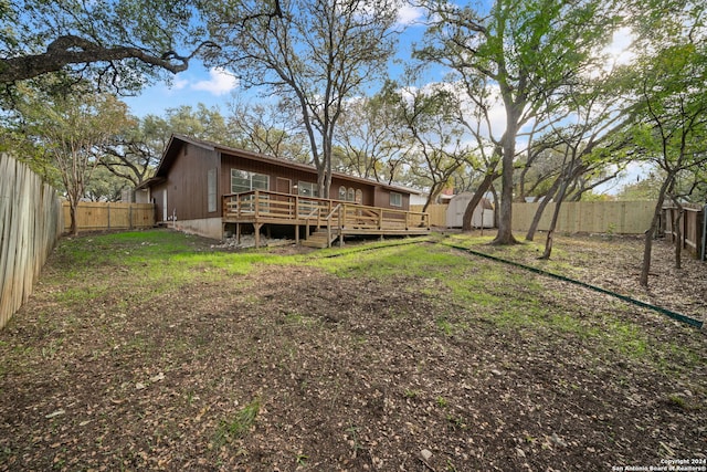 view of yard featuring a deck