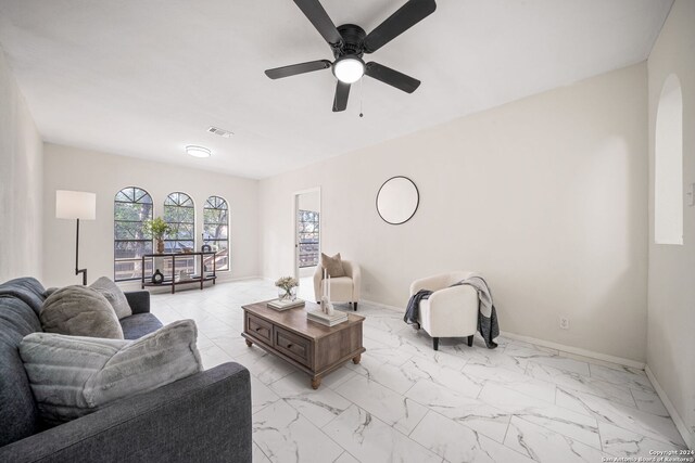 living room featuring ceiling fan