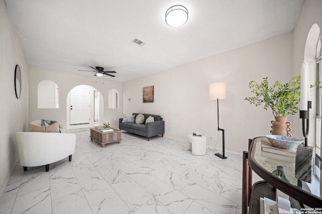 living room with ceiling fan