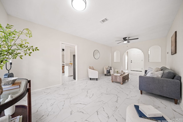 living room with ceiling fan