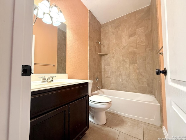 full bathroom with tile patterned flooring, vanity, toilet, and tiled shower / bath