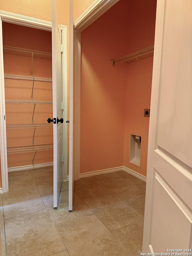 clothes washing area featuring electric dryer hookup