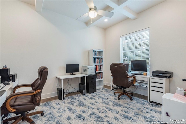 office area featuring beamed ceiling, ceiling fan, and light hardwood / wood-style floors