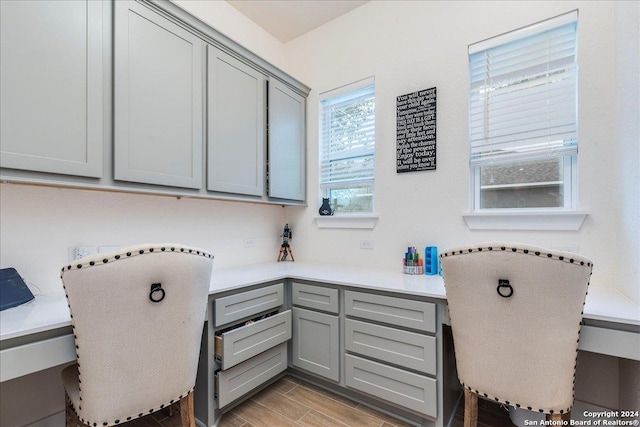 laundry area with light hardwood / wood-style flooring