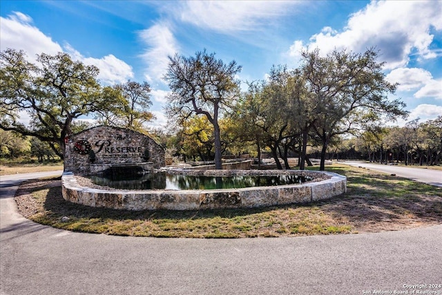 view of community with a water view