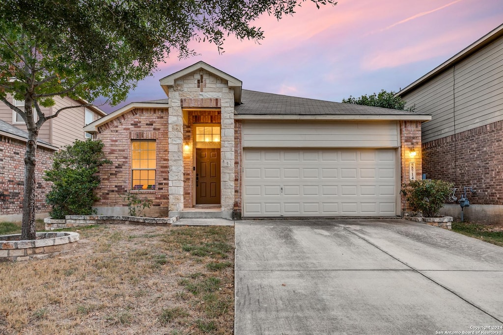 8714 Yormis Nest, San Antonio, TX 78251 - view of front facade featuring a garage