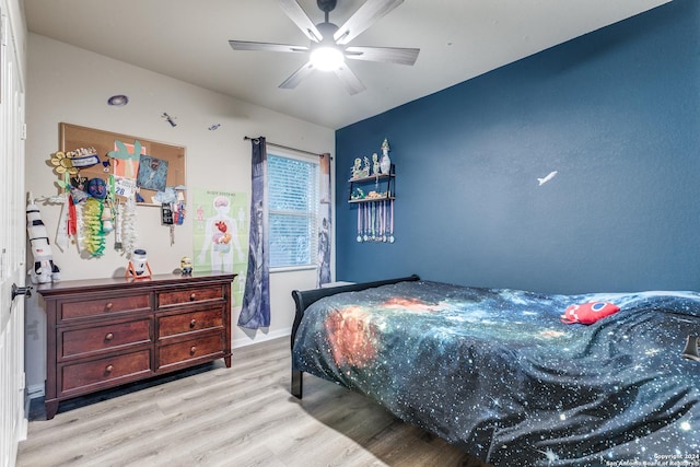 bedroom featuring ceiling fan and light wood-type flooring