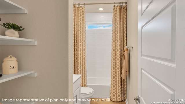 full bathroom featuring toilet, vanity, and shower / tub combo with curtain