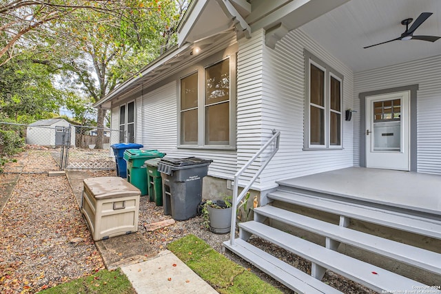 property entrance featuring ceiling fan