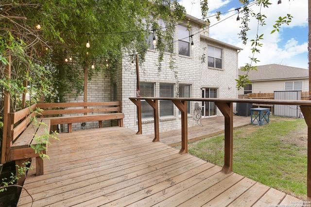 wooden deck with a yard