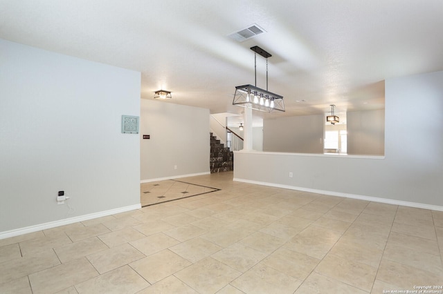 empty room featuring light tile patterned flooring