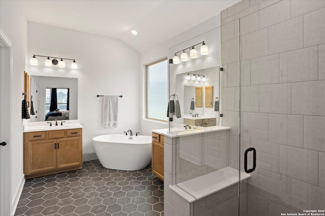 bathroom with vanity, tile patterned flooring, plus walk in shower, and lofted ceiling