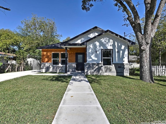 view of front of house with a front yard