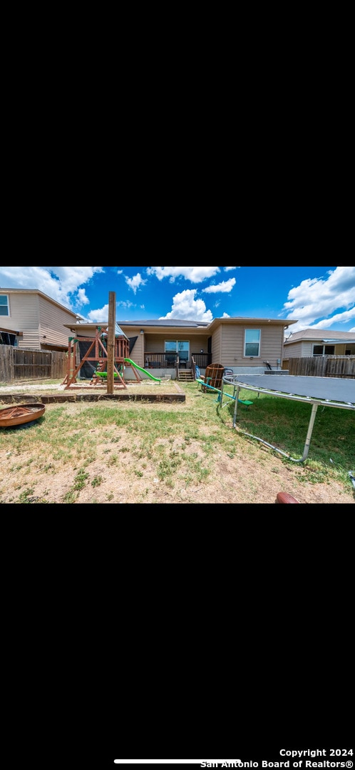 view of yard with a playground