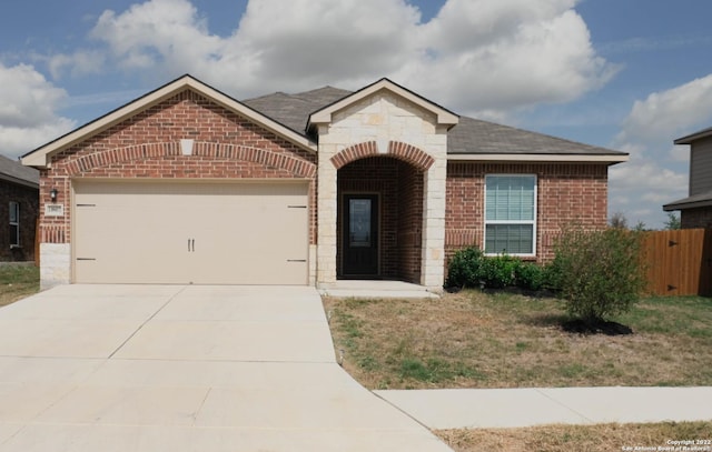 view of front of property featuring a garage