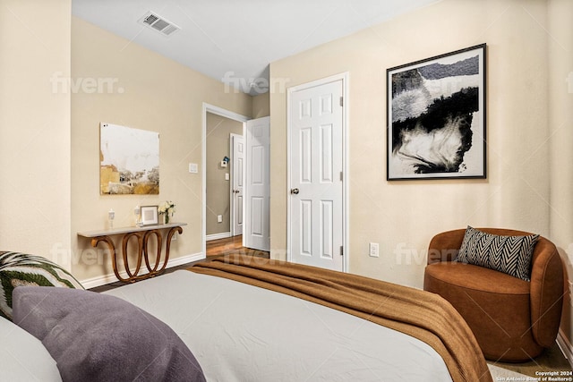 bedroom with wood-type flooring