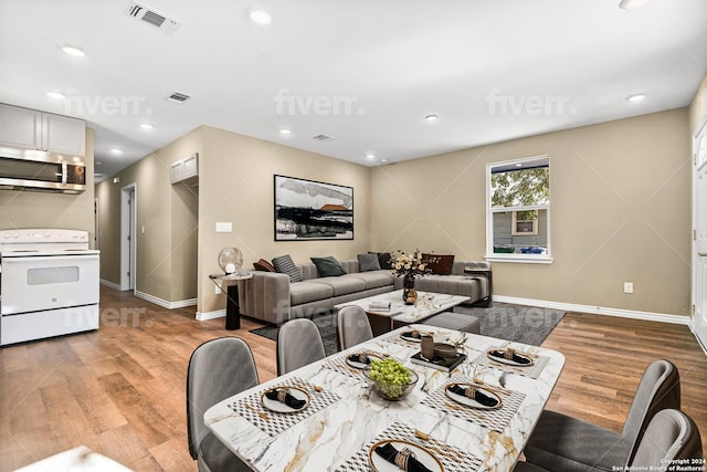 dining area featuring light hardwood / wood-style floors