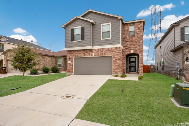 view of front of home with a garage and a front lawn