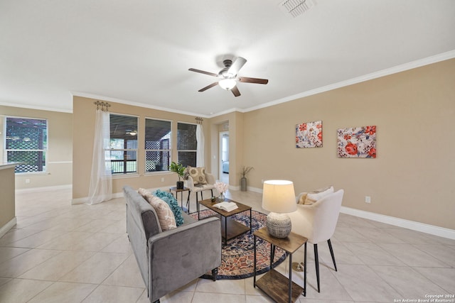 living room with light tile patterned floors, ceiling fan, and crown molding