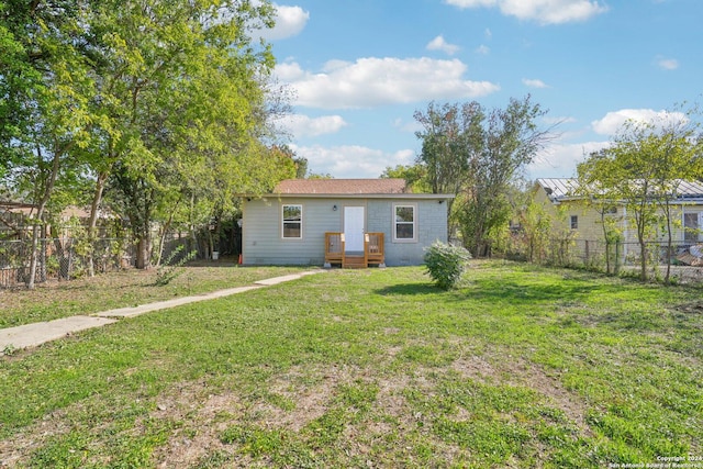 exterior space with a front lawn