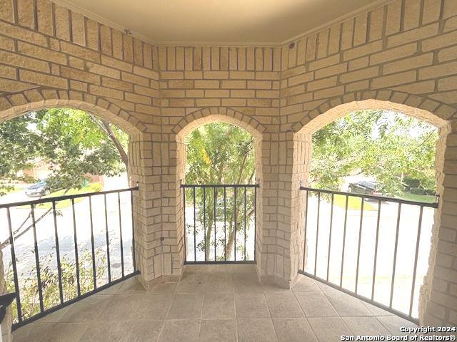 view of patio with a balcony