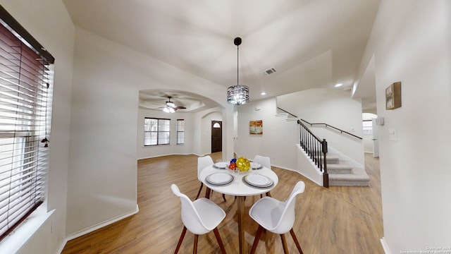 dining area featuring ceiling fan and light hardwood / wood-style floors