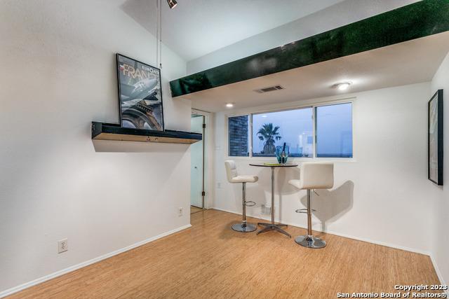 interior space with hardwood / wood-style floors