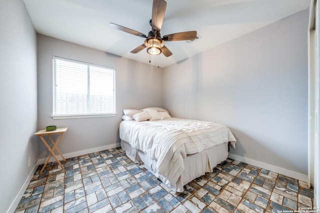 bedroom featuring ceiling fan