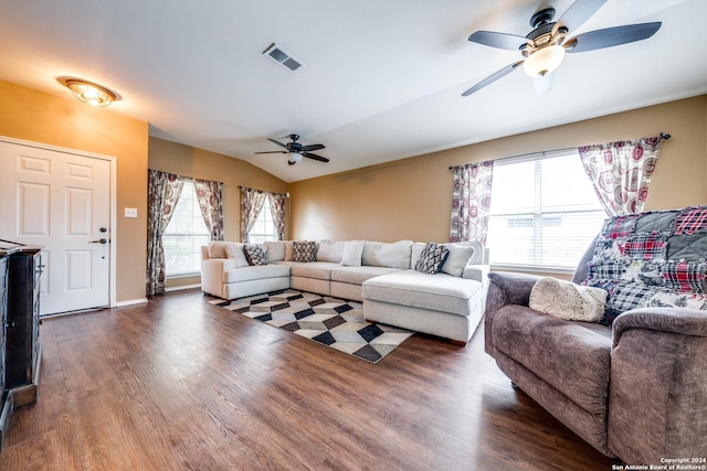 living room with vaulted ceiling, ceiling fan, and dark hardwood / wood-style floors