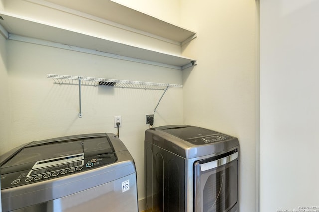 laundry area with washer and dryer