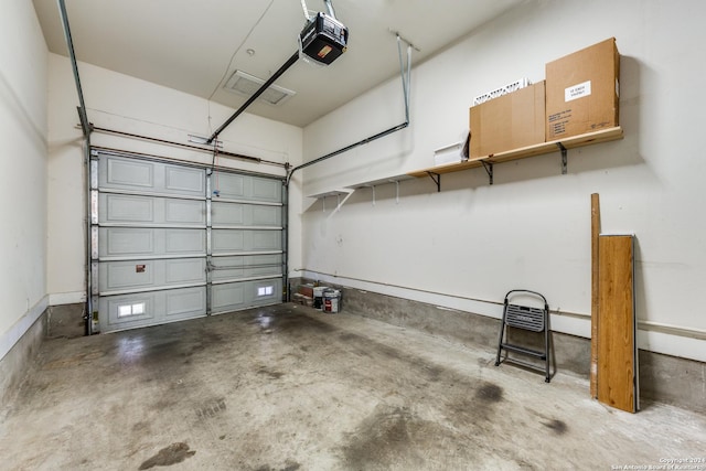 garage featuring a garage door opener