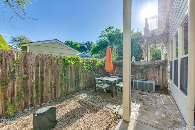 view of patio featuring central air condition unit