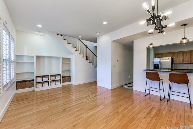 living room with light hardwood / wood-style flooring