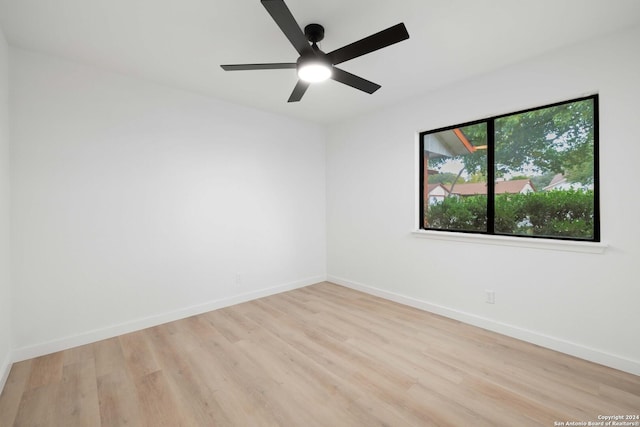 unfurnished room featuring ceiling fan and light hardwood / wood-style floors