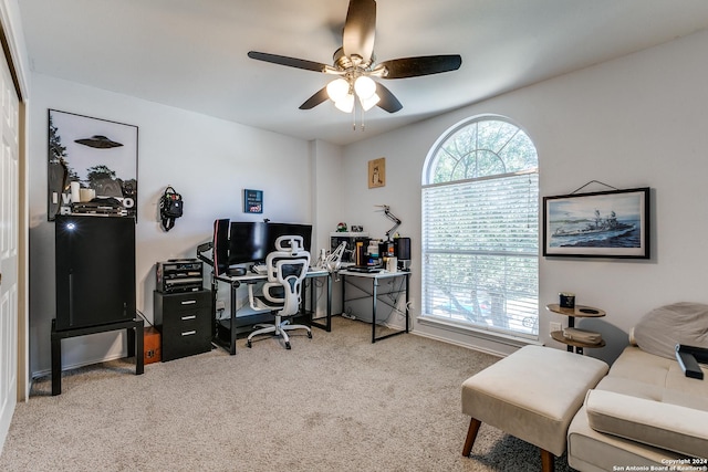 office with carpet flooring and ceiling fan