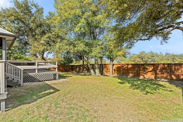 view of yard with a deck