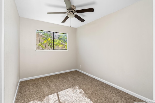 spare room with ceiling fan and carpet floors