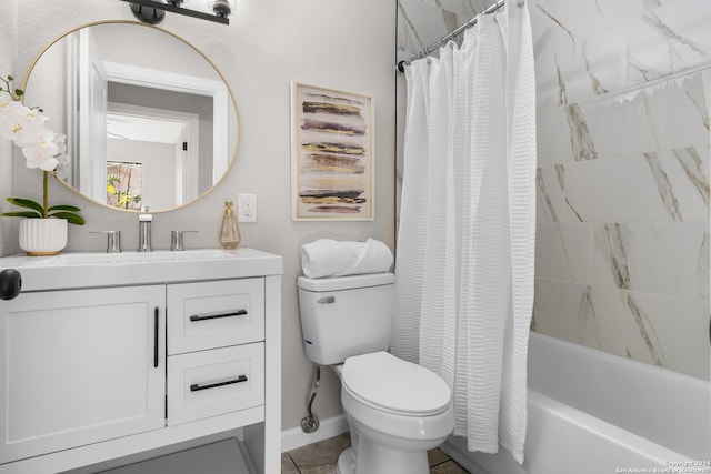 full bathroom featuring toilet, vanity, and shower / tub combo with curtain