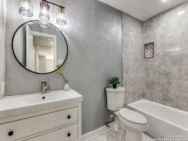 full bathroom with vanity, toilet, and tiled shower / bath