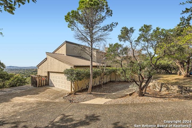 view of front of property featuring a garage