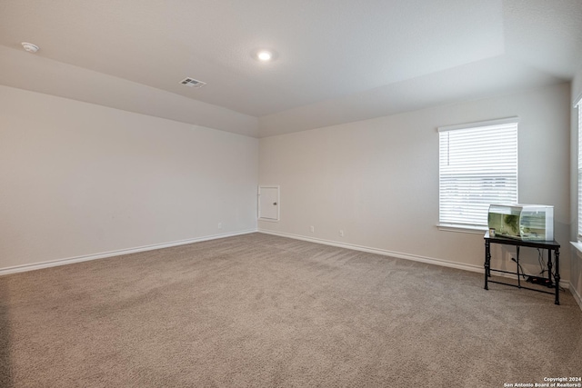 spare room with carpet floors