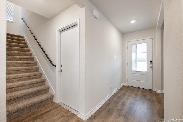 doorway to outside with dark hardwood / wood-style flooring