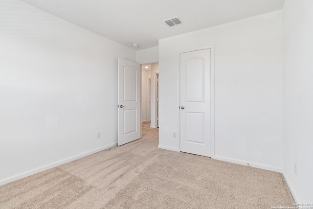3146 Jackson Smt, Converse, TX 78109 - unfurnished room featuring light carpet and a smoke detector