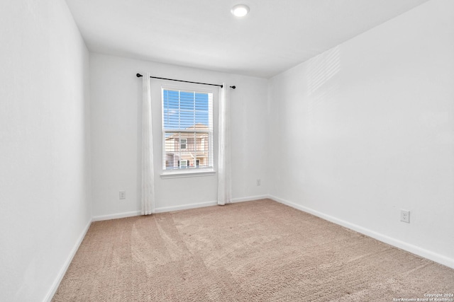 3146 Jackson Smt, Converse, TX 78109 - carpeted spare room featuring baseboards