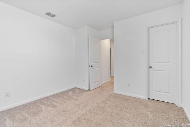 3146 Jackson Smt, Converse, TX 78109 - unfurnished bedroom featuring light carpet and baseboards